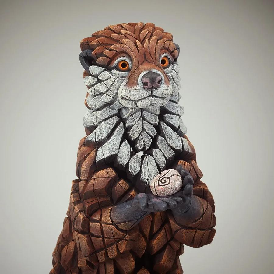 Otter Sculpture With Pebbles